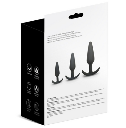 Product packaging with three black cylindrical objects on a white background