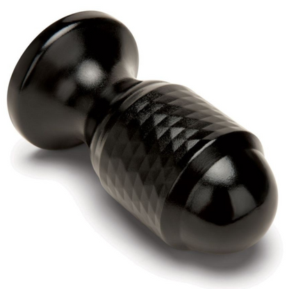 Black anal plug with textured surface on a white background