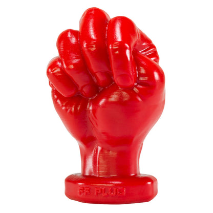 Red rubber fist toy on a white background
