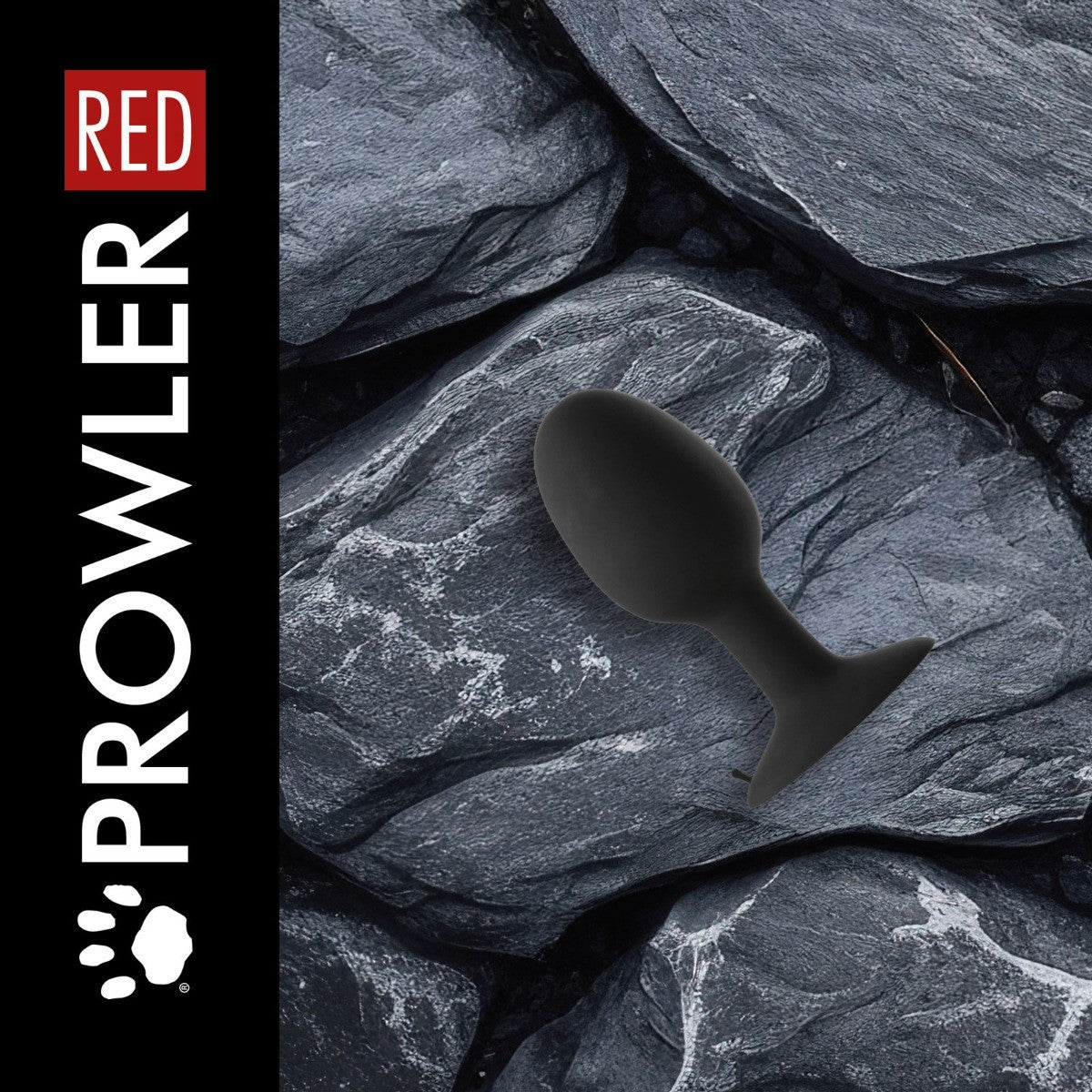 Black sex toy on gray stone surface with 'RED' and 'Prowler' branding.