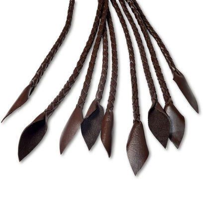 Set of braided brown leather straps on a white background