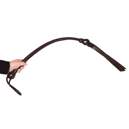 Brown leather whip held by a hand on a white background