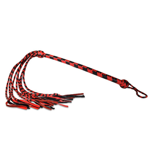 Red and black plaited whip on a white background