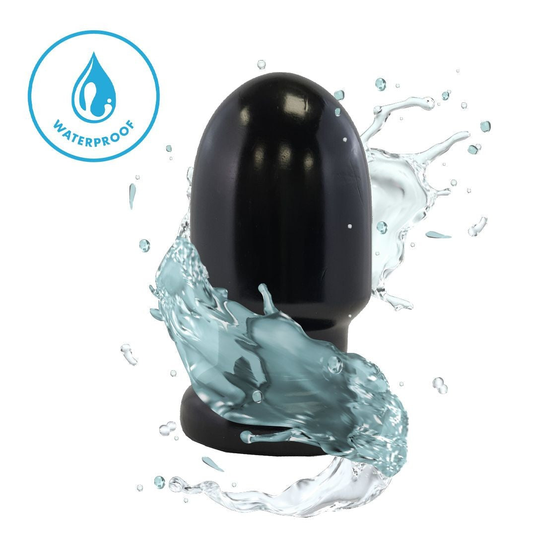 Black waterproof device with water splashes on a white background