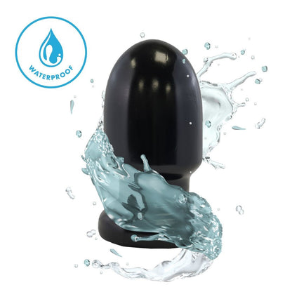 Black waterproof device with water splashes on a white background
