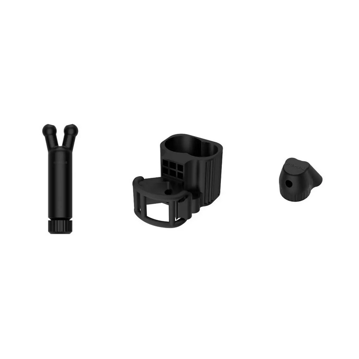 Set of black plastic components on a white background