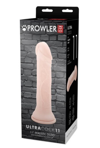 Prowler Ultra Cock 11 realistic dildo packaging against a brick wall background