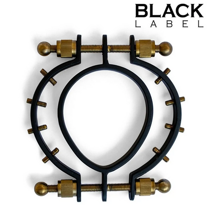 Metal pussy clamp with gold accents on a white background, featuring 'Black Label' branding.