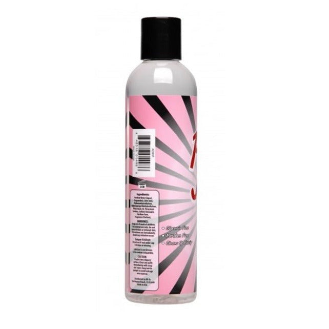 Bottle with a pink and black label on a white background
