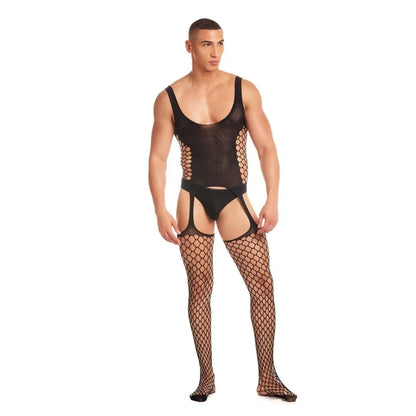 Man wearing a black fishnet bodysuit and stockings on a white background