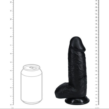Black silicone product with a can for scale on a white background with measurement markings.