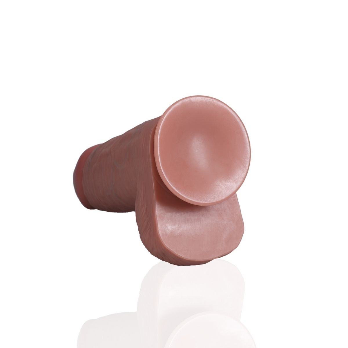 Pink silicone suction cup on a white background