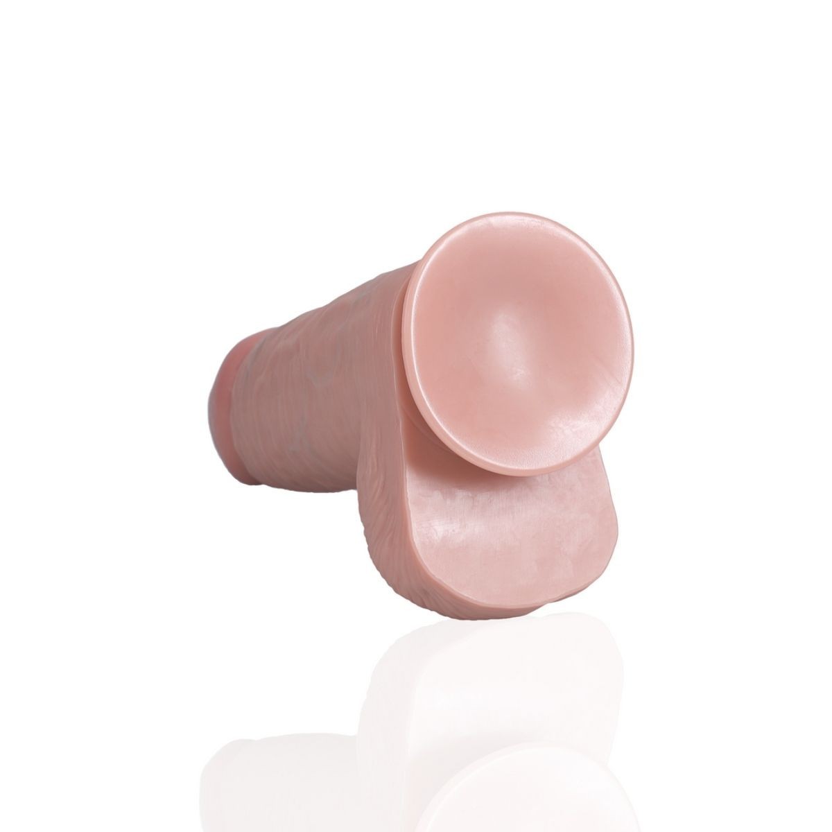 Pink silicone suction cup on a white background