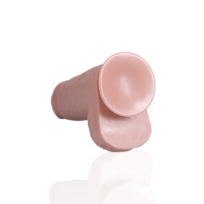 Pink silicone suction cup on a white background