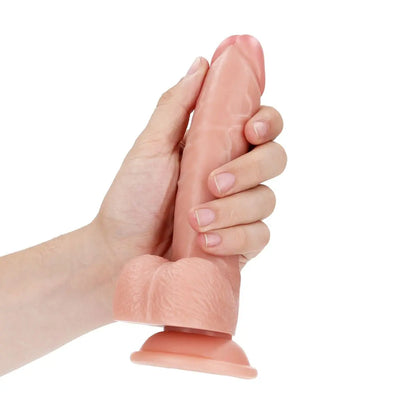 RealRock Realistic Curved Suction Cup Silicone Dildo With Balls Pink 7 Inch on a white background