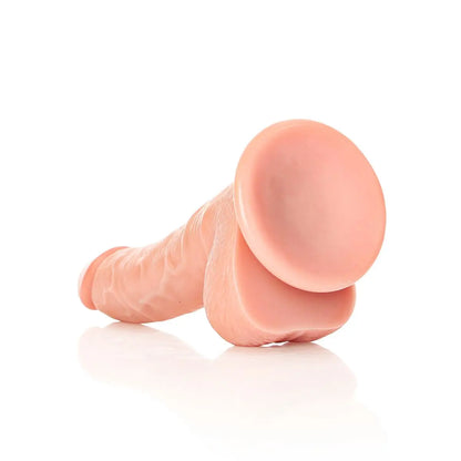 RealRock Realistic Curved Suction Cup Silicone Dildo With Balls Pink 7 Inch on a white background