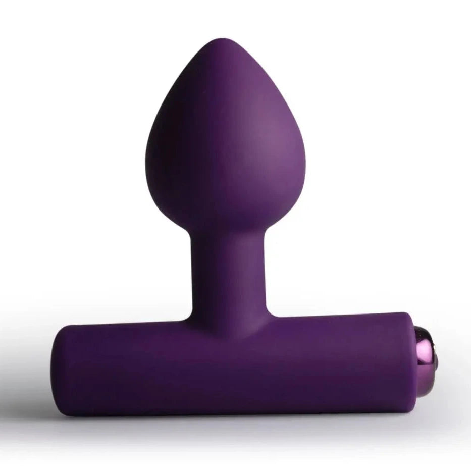 Purple butt plug on a white background
