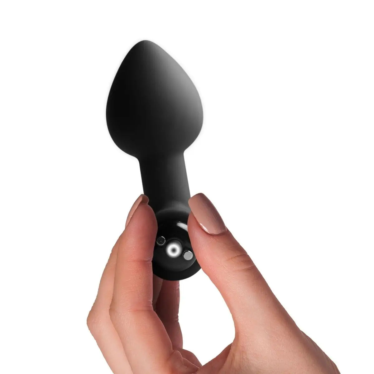 Black handheld anal massage device held in a hand against a white background