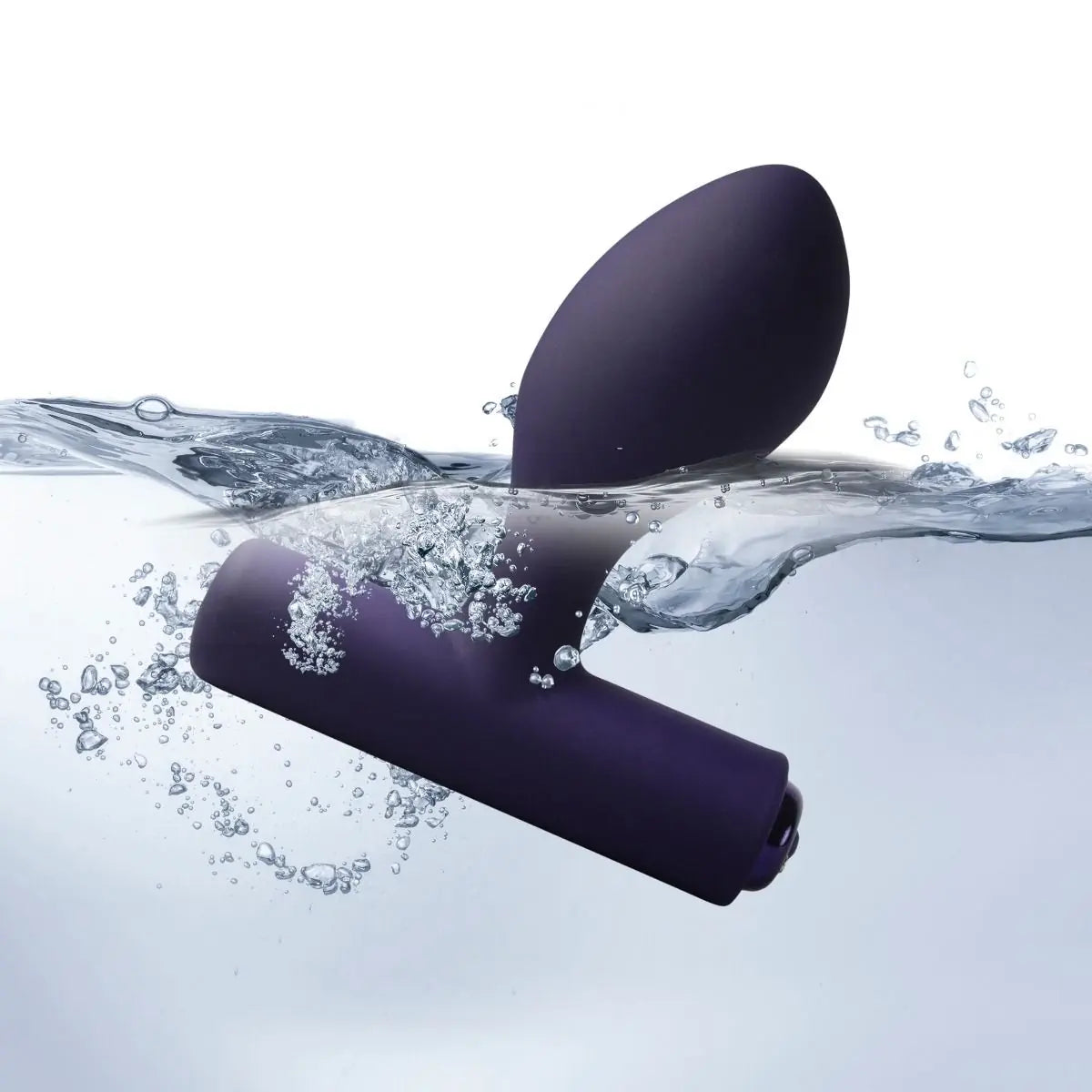 Anal Prostate Massager floating on water with bubbles
