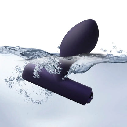 Anal Prostate Massager floating on water with bubbles
