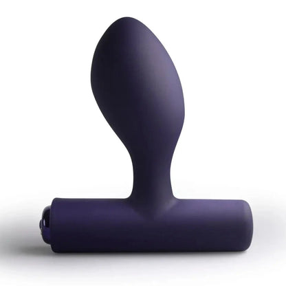 Purple silicone butt plug on a white background