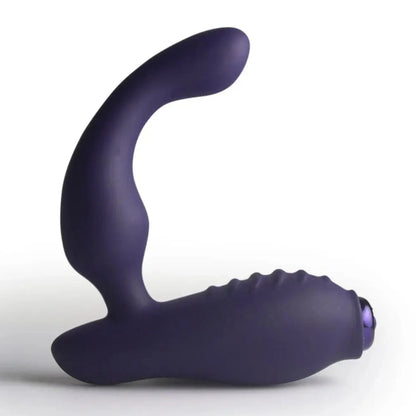 Purple silicone butt plug on a white background