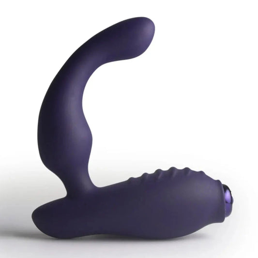 Purple silicone butt plug on a white background