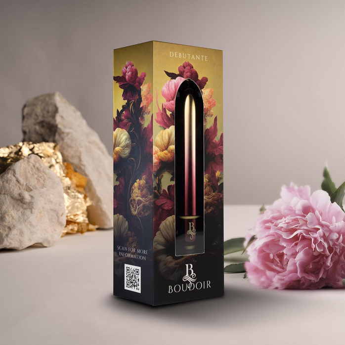Boudoir product packaging with floral design on a neutral background
