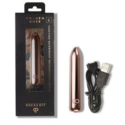 Rose gold electronic device with packaging and USB cable on a white background