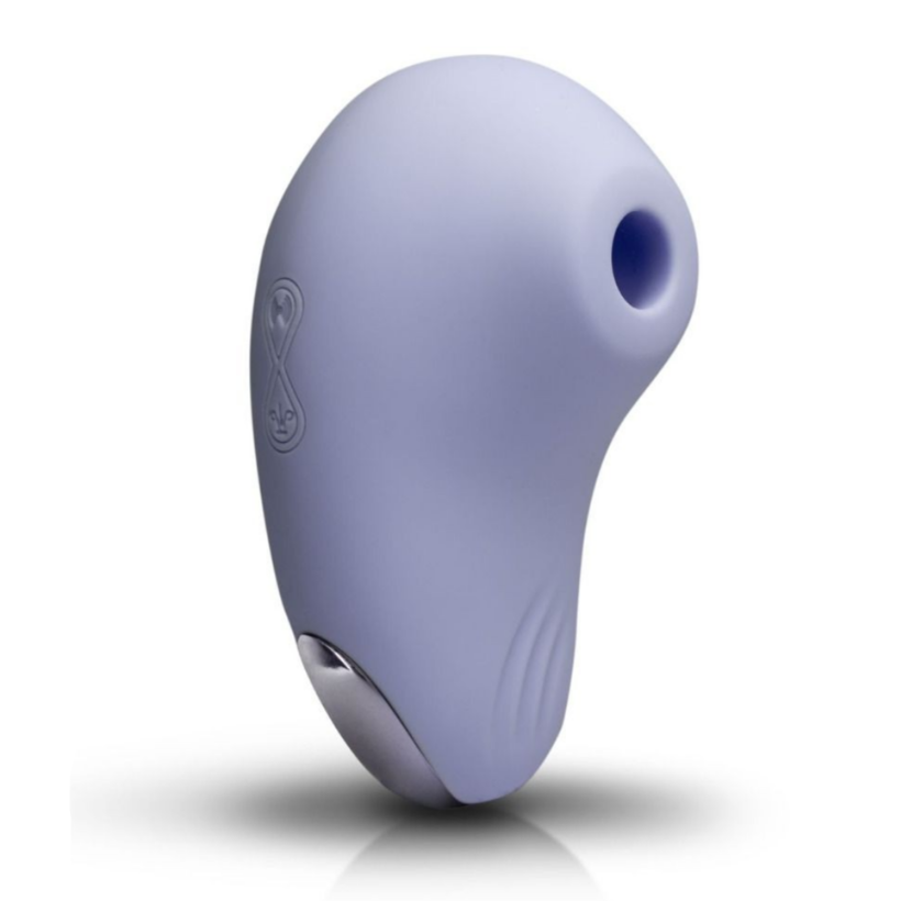 Purple silicone clitoral massager on a white background