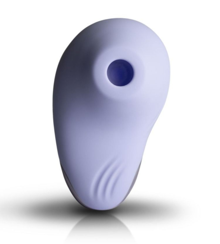 Purple plastic object with a central hole on a white background