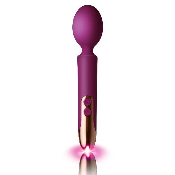 Purple and rose gold electronic device with a glowing pink light on a white background