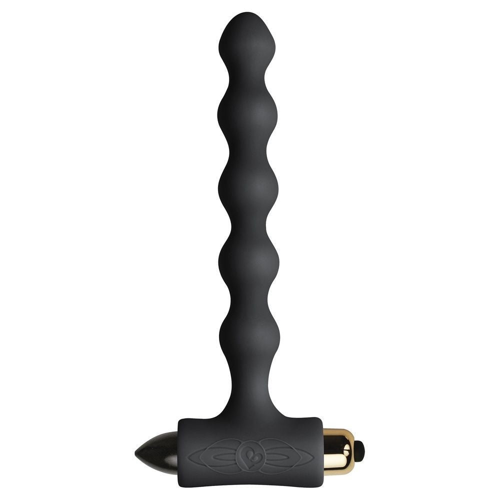 Black and gold anal massage tool on a white background
