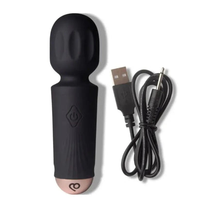 Black silicone wand with USB cable on a white background