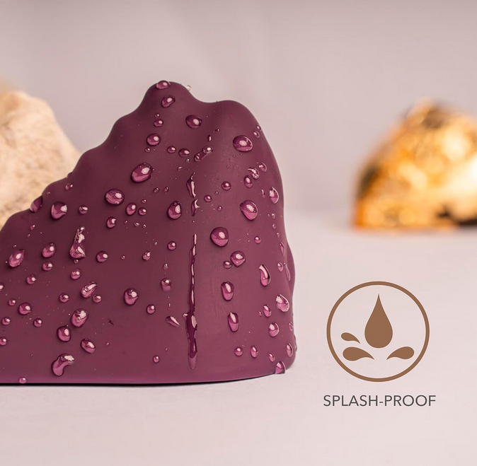 Purple object with water droplets and 'splash-proof' logo on a light background
