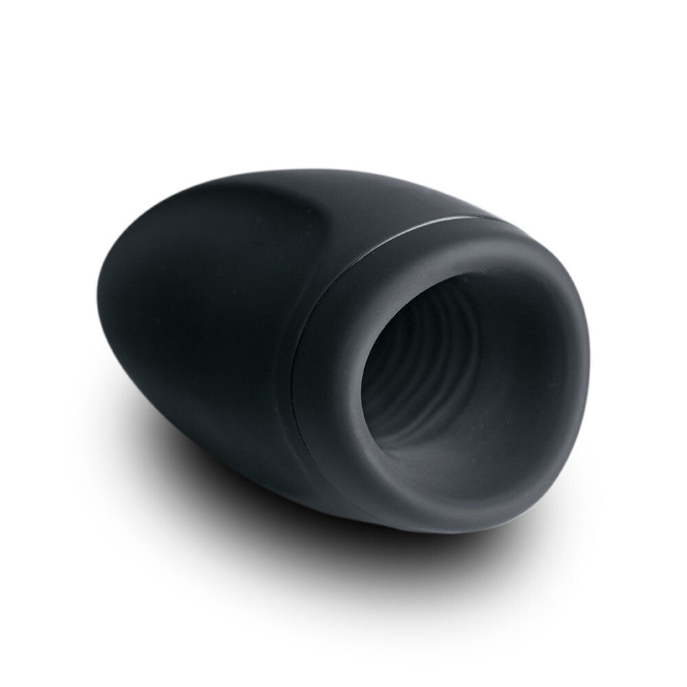 Black silicone msturbation sleeve on a white background