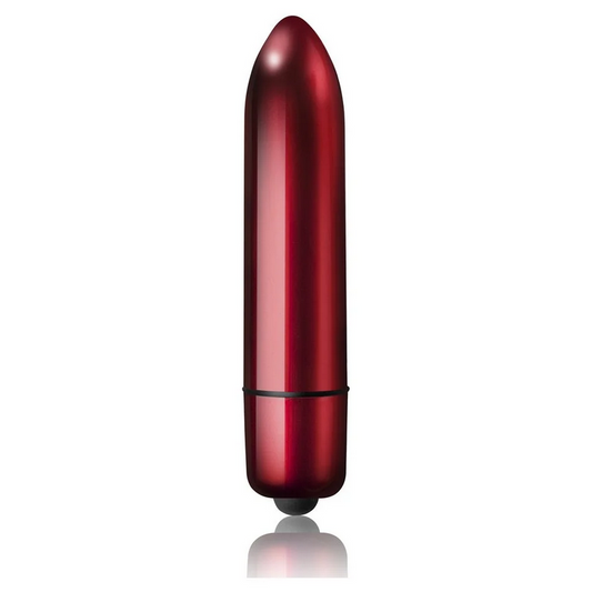 Red cylindrical bullet vibrator on a white background