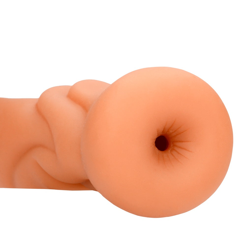 Close-up of a silicone anal masturbator on a white background