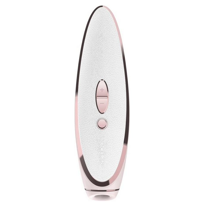 White and rose gold electronic massage device on a white background