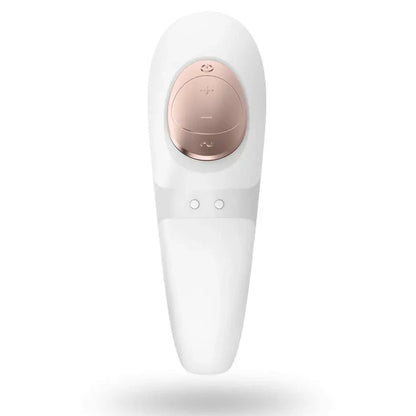 White and rose gold electronic massage device on a white background
