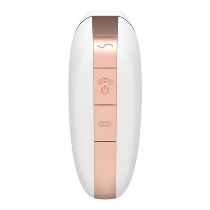 White and rose gold electronic device with buttons on a white background
