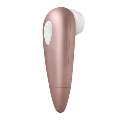 Rose gold wireless clitoral massager on a white background