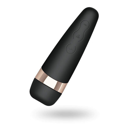 Black and rose gold electronic device on a white background