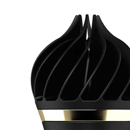 Black and gold vibrator on a white background