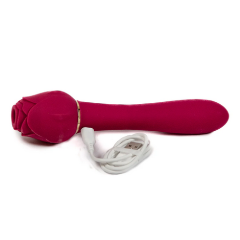 Red handheld device with a white cord on a white background