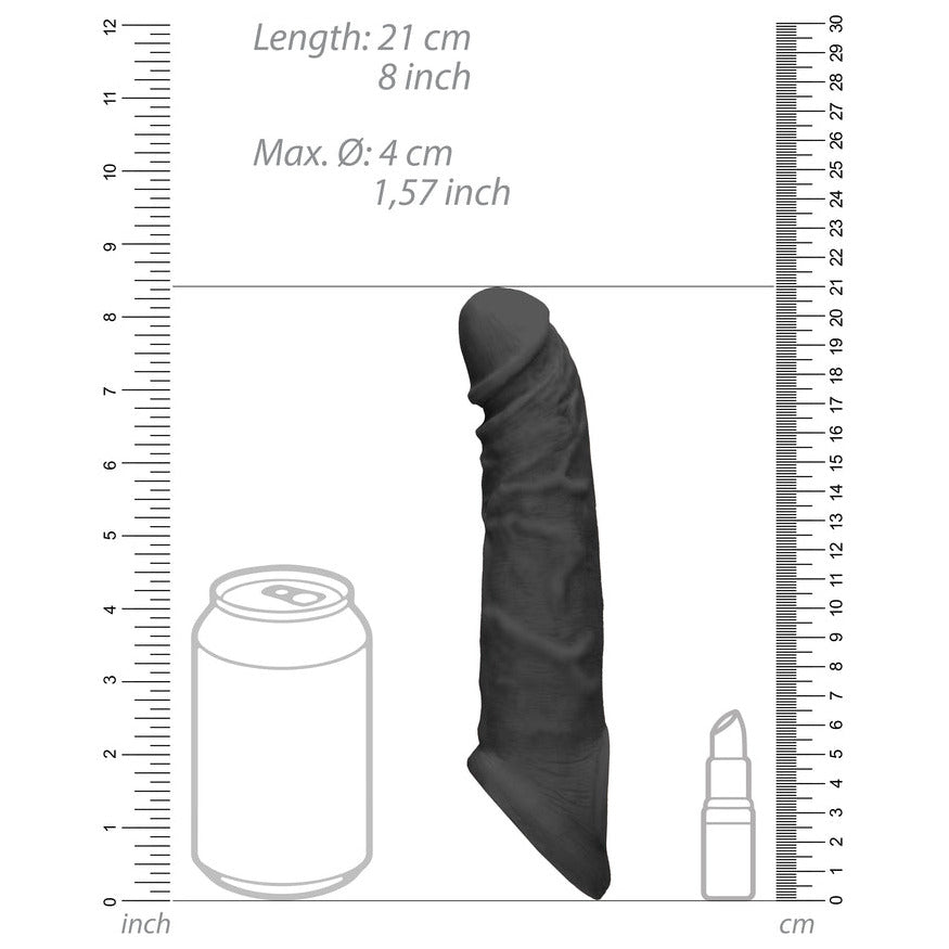 Measurement chart showing the size of a black penis extension sheath with a can and lipstick for scale.