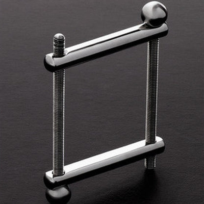 Shots Steel The Ball Crusher CBT Bondage Fetish Clamp Silver Stainless Steel on a dark background
