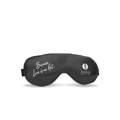 Black sleep mask with 'Because Love is an Art' text and Shunga logo on a white background