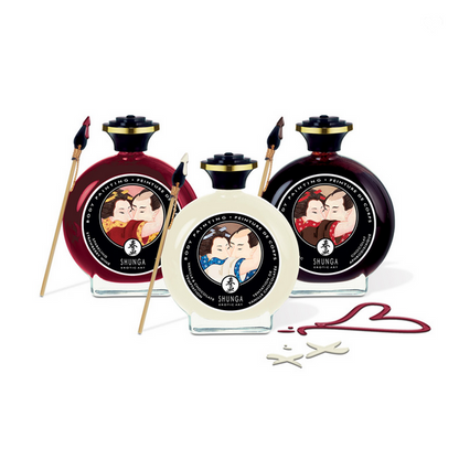 Shunga product set with three bottles and accessories on a white background