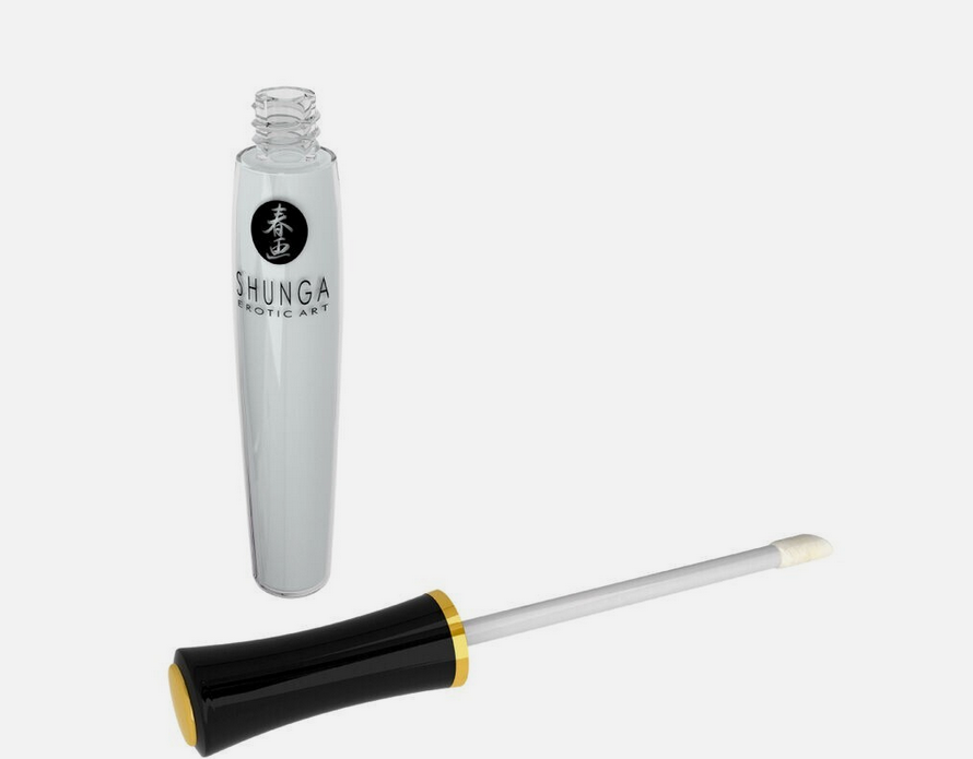 Shunga product with a white container and black and gold applicator on a white background